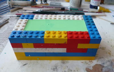 picture of cast rubber encased in Lego